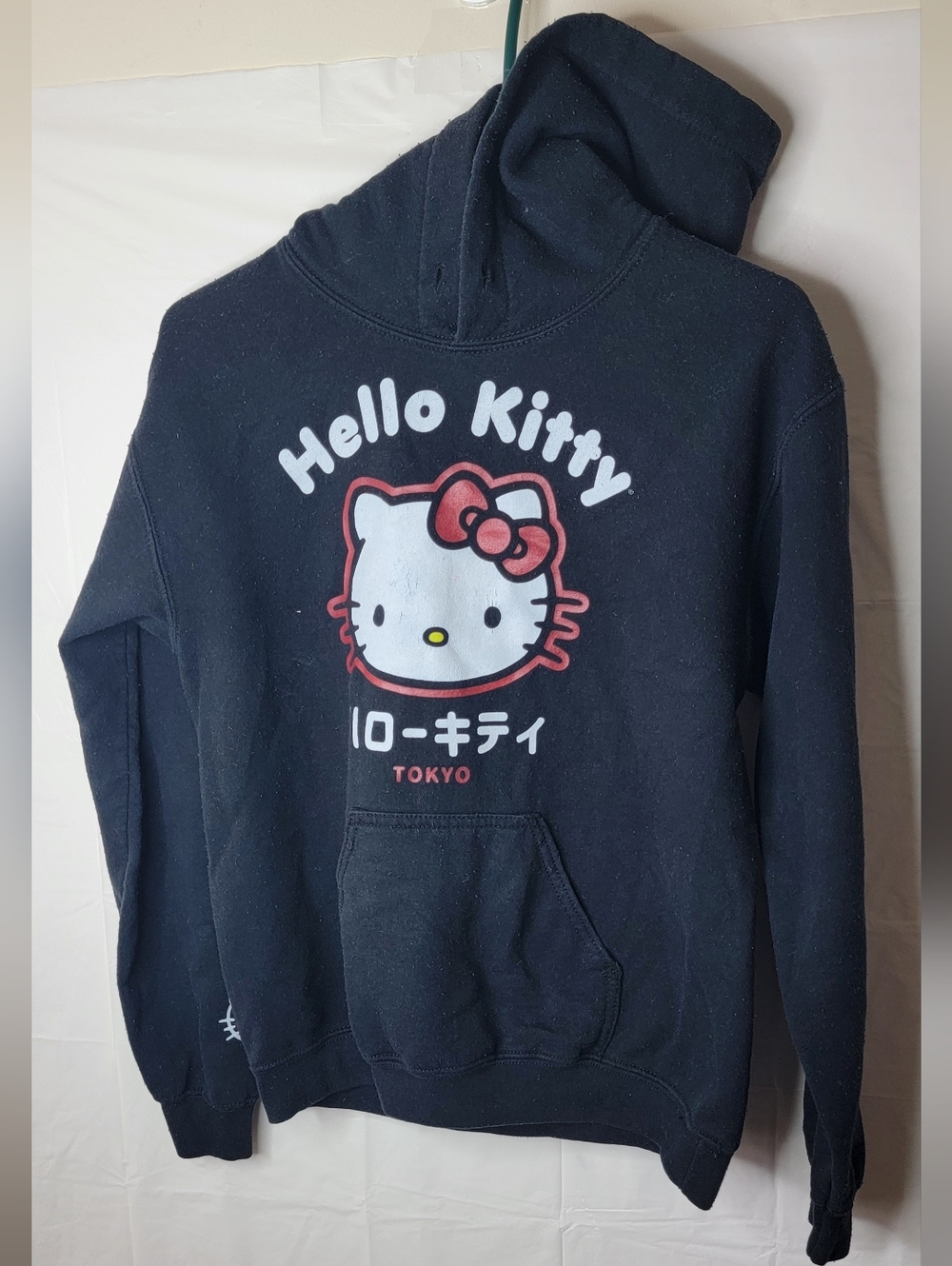 Juniors Hello Kitty Black Pullover with Red Bow Graphic